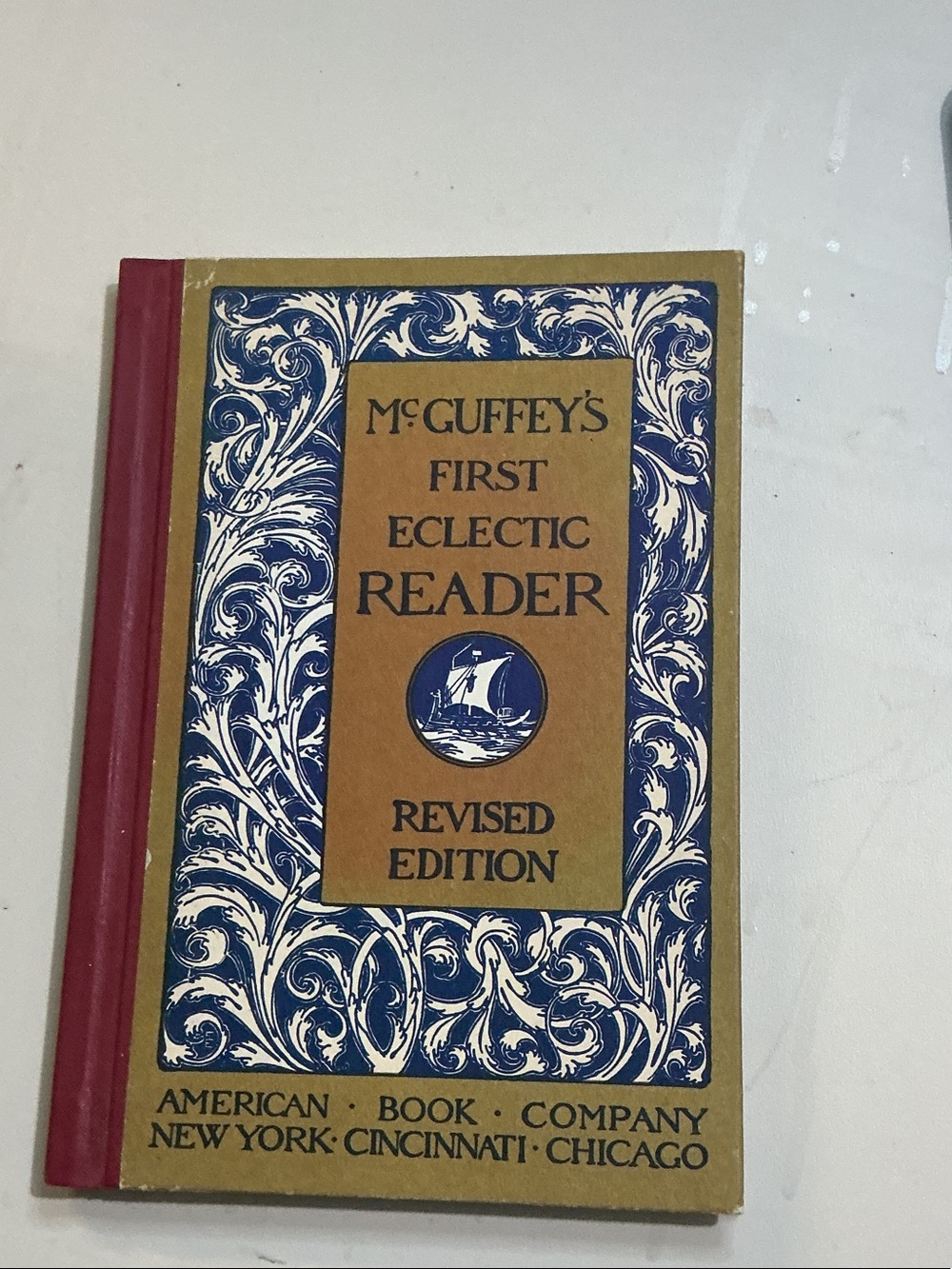 McGuffey's First Eclectic Reader - Blue & Tan Decorative Cover